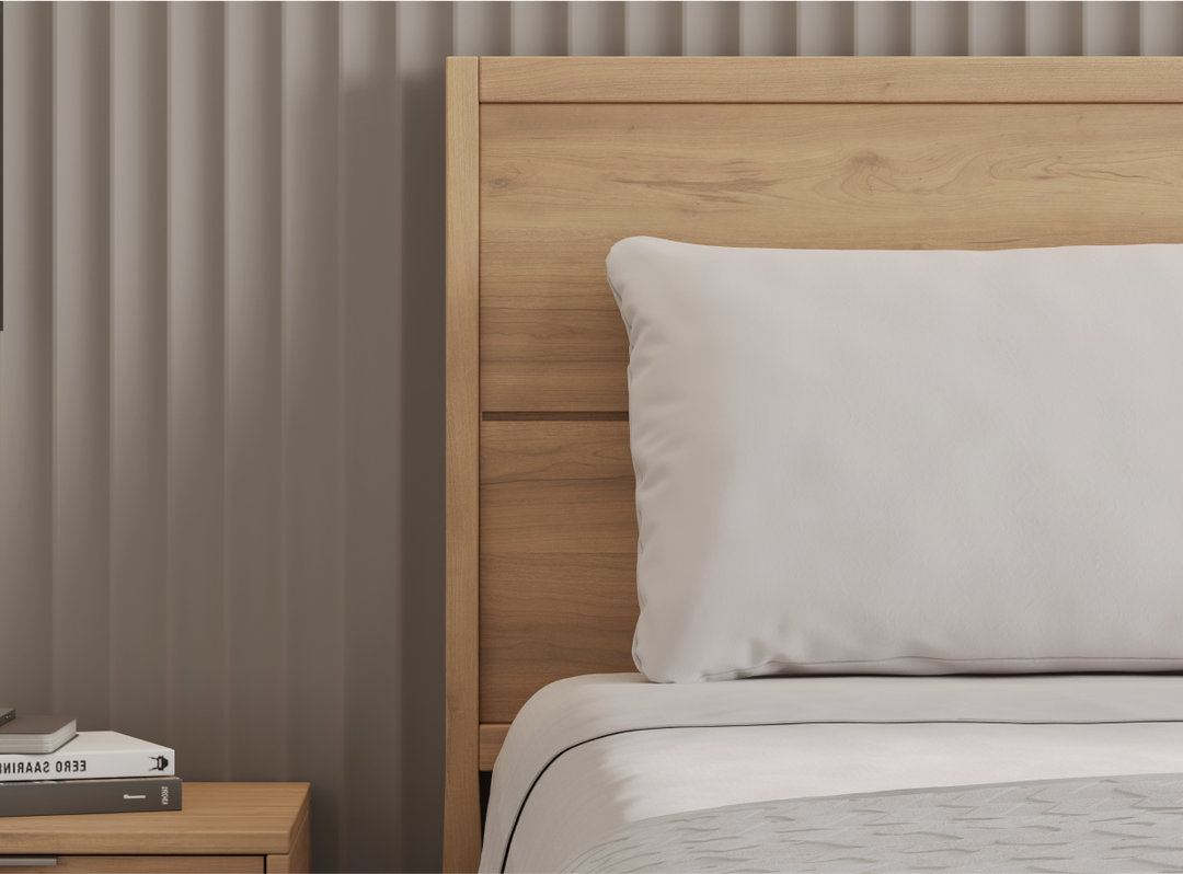 A closeup image of the Ludlow Bed Frame  in a bedroom scene