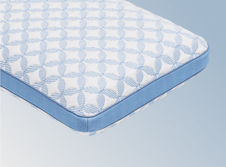 An image of the GlacioTex Cooling Pillow on a light blue gradient background