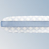 An image of the GlacioTex Cooling Pillow on a light blue gradient background