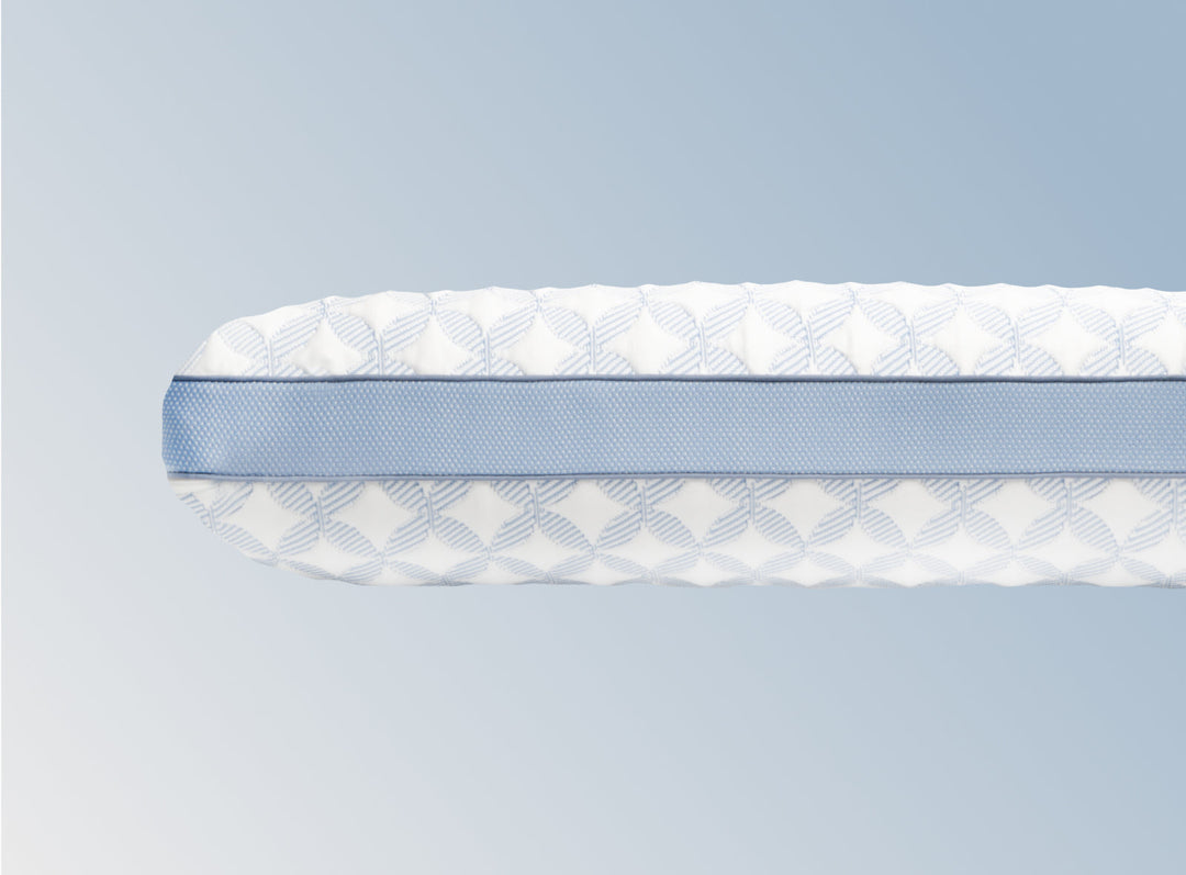 An image of the GlacioTex Cooling Pillow on a light blue gradient background