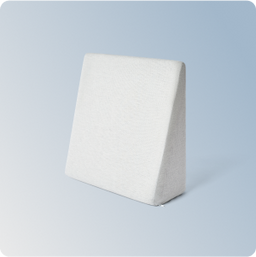 The Helix Wedge Pillow on a blue gradient background